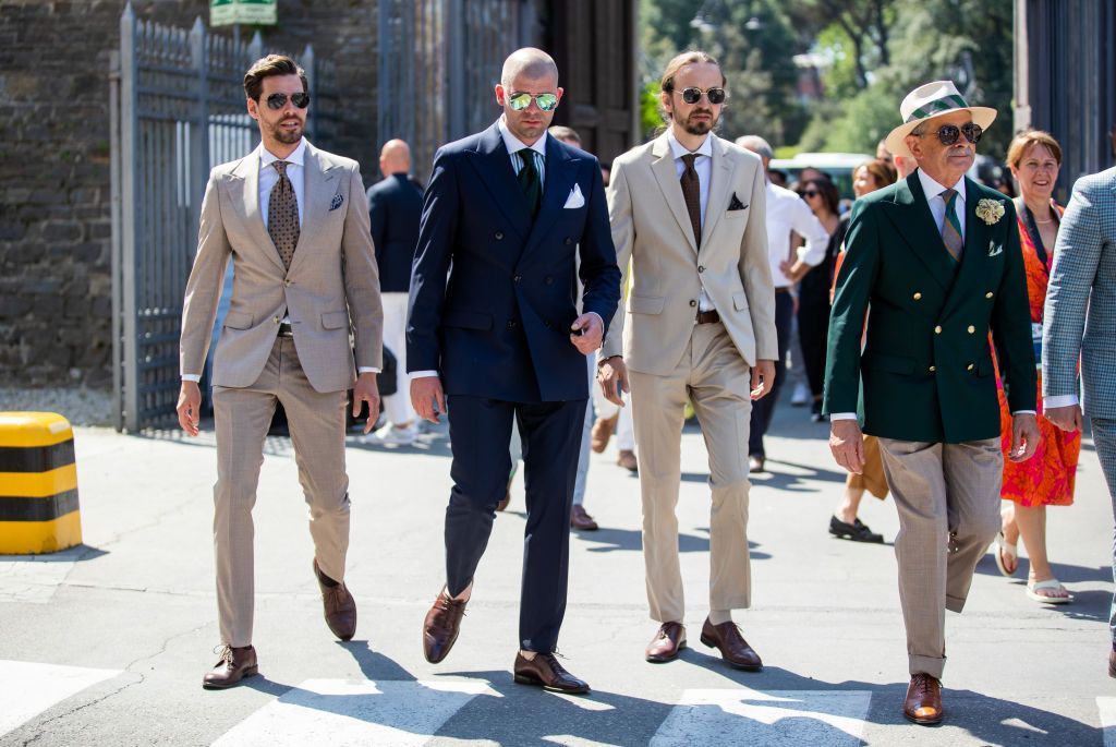 FLORENCE ITALY  JUNE 15 Guests seen wearing suits at the Pitti Immagine Uomo 102 at Fortezza Da Basso on June 15 2022 in...
