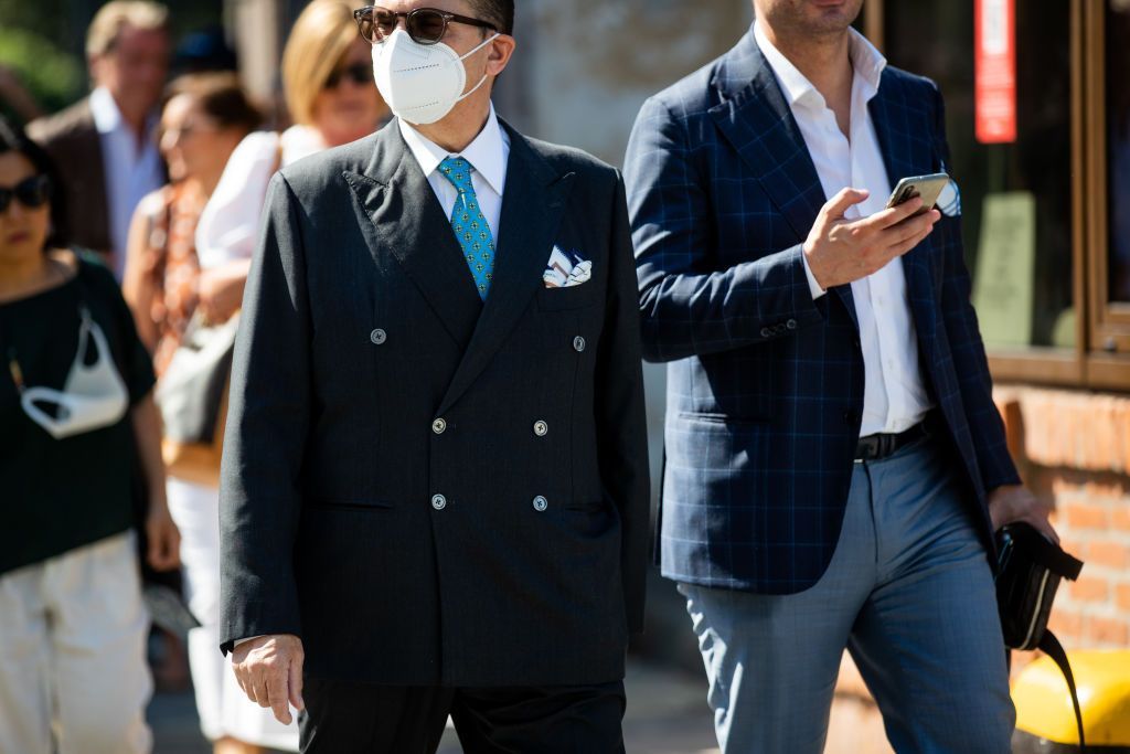 FLORENCE ITALY  JUNE 15 A guest is seen wearing black double breasted suit at the Pitti Immagine Uomo 102 at Fortezza Da...
