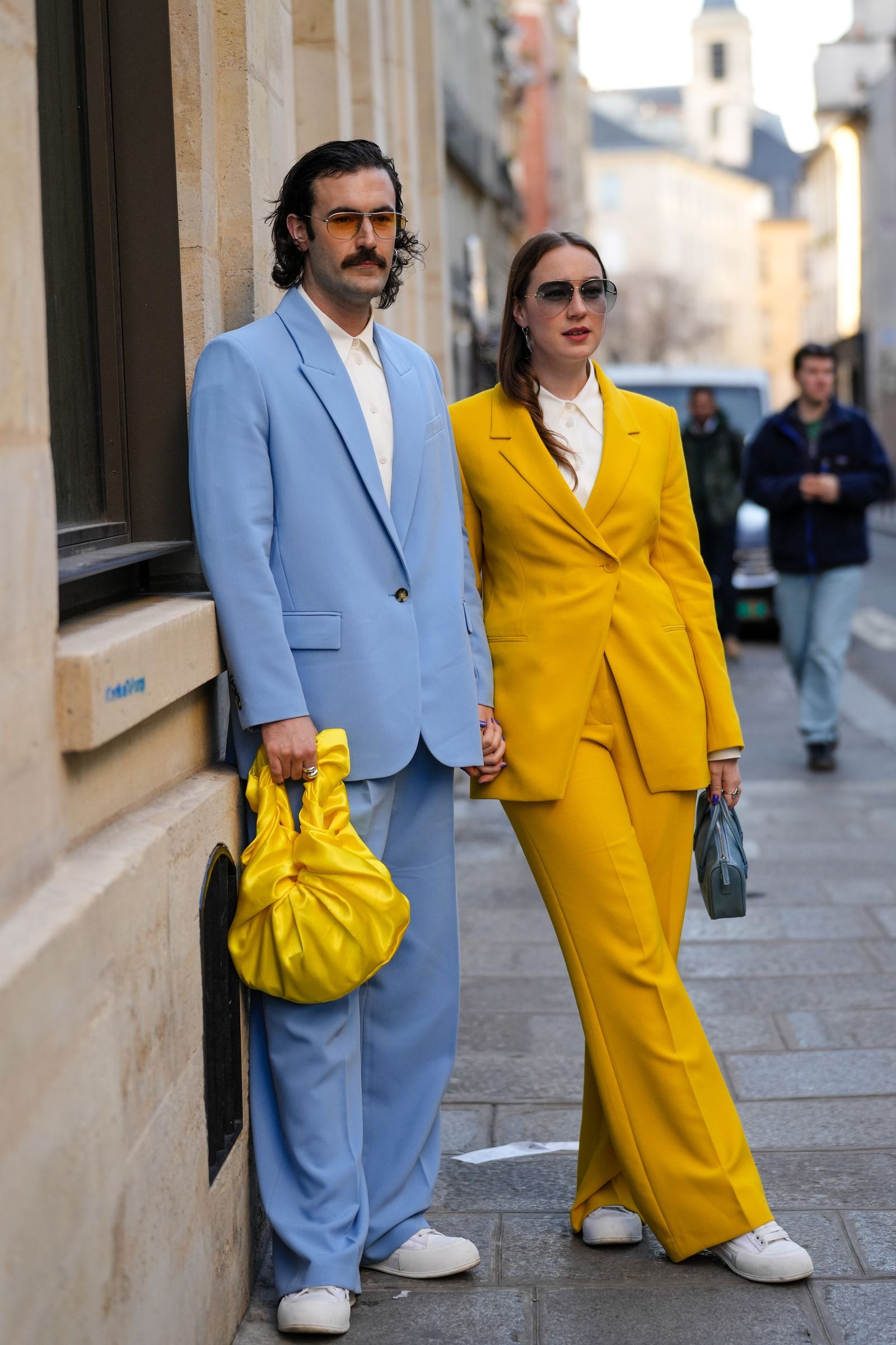 PARIS FRANCE  FEBRUARY 28 A guest  wears sunglasses a white shirt a pale blue blazer jacket matching pale blue suit...