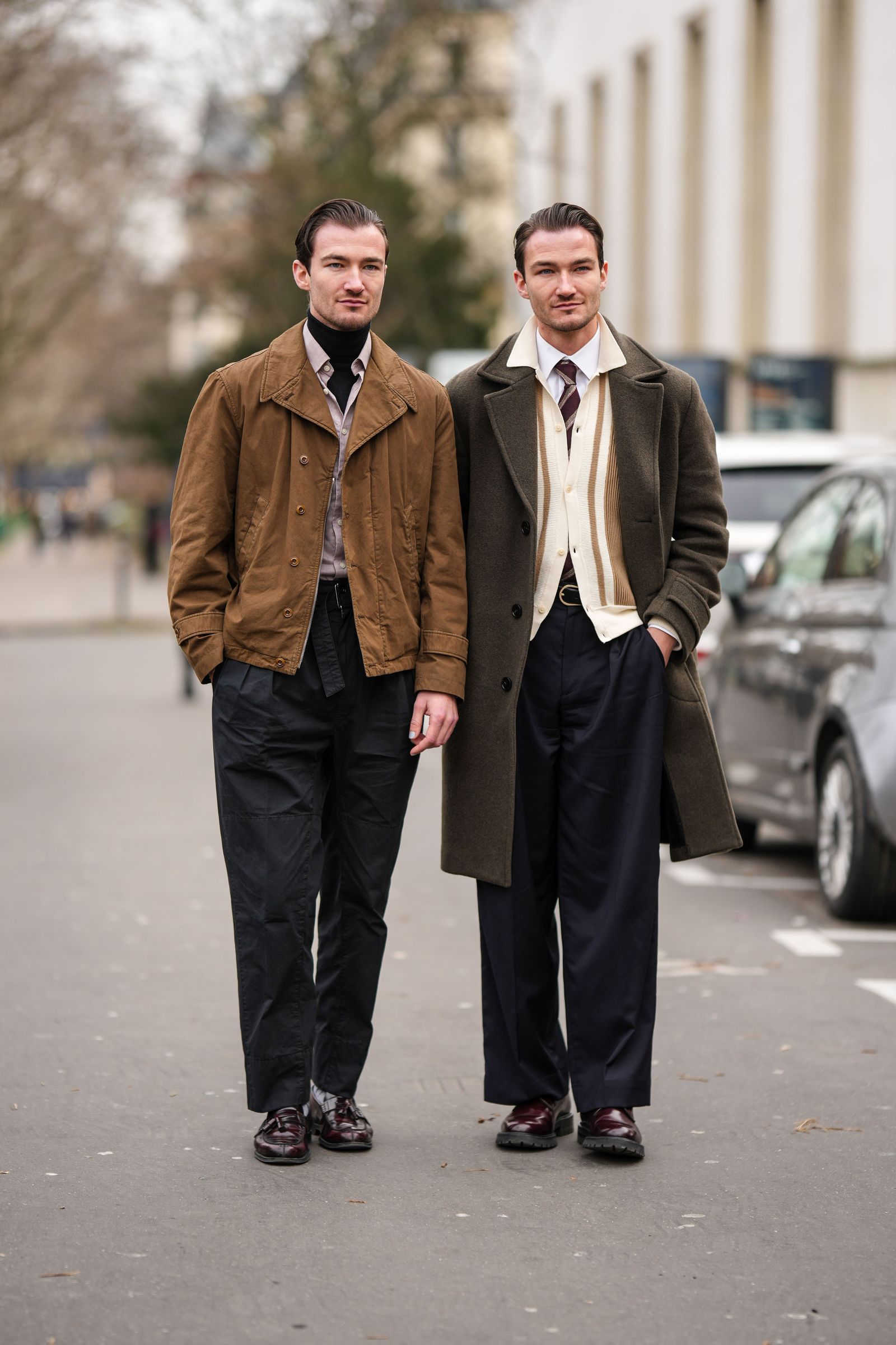PARIS FRANCE  JANUARY 19 A guest  wears a black turtleneck pullover a pale red shirt a brown zipper jacket coat black...