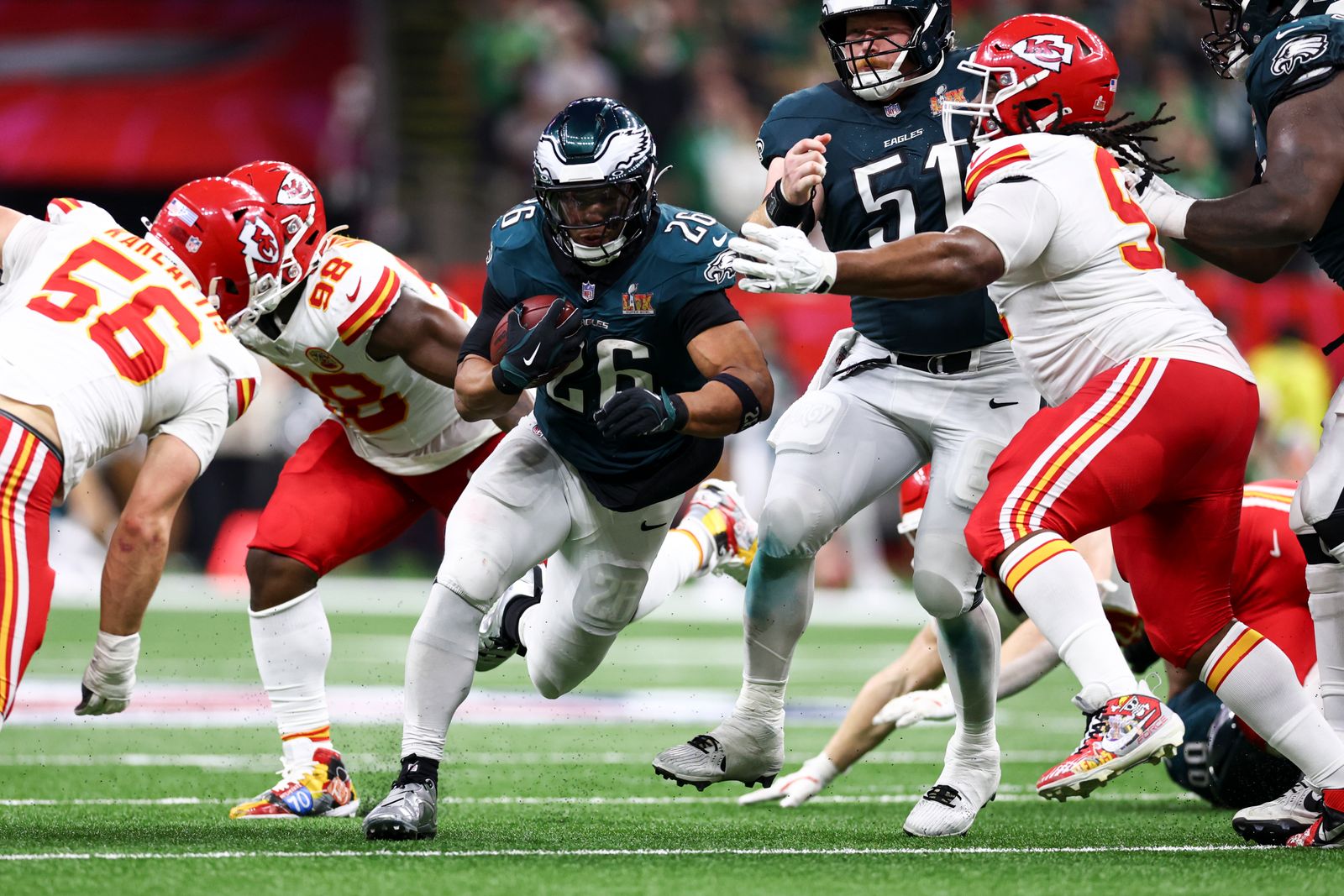 NEW ORLEANS LOUISIANA  FEBRUARY 9 Saquon Barkley 26 of the Philadelphia Eagles carries the ball against the Kansas City...