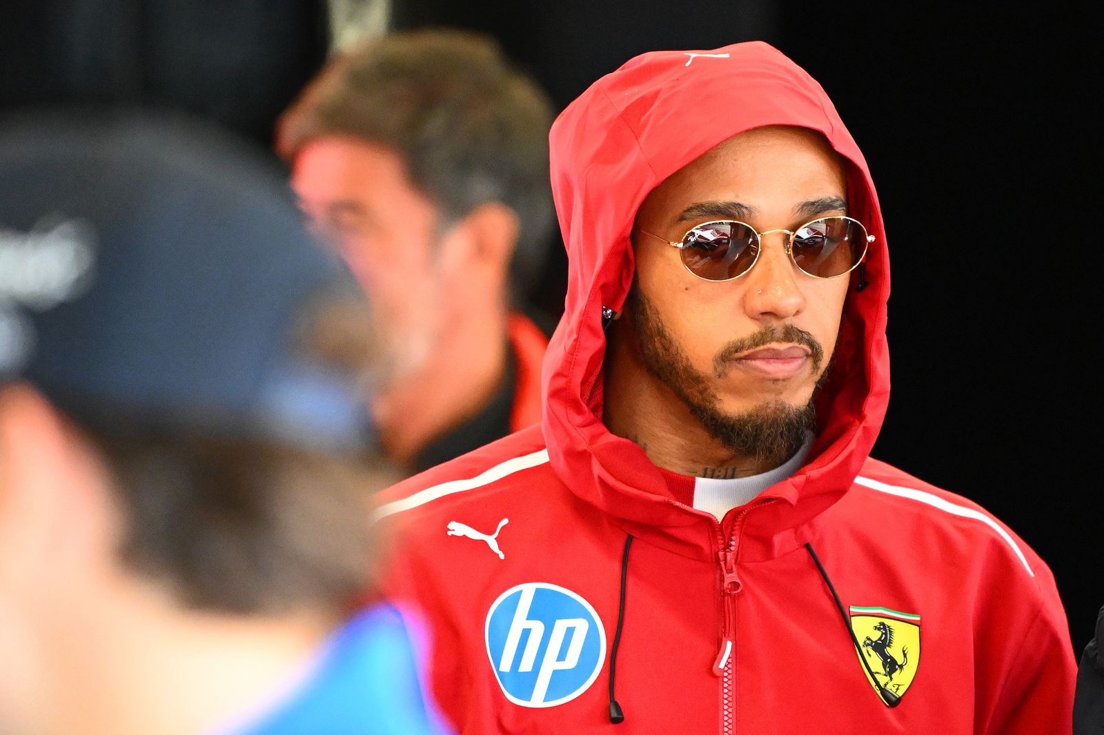 NORTHAMPTON ENGLAND  JULY 06 Lewis Hamilton of Great Britain and Scuderia Ferrari on the drivers parade prior to the F1...