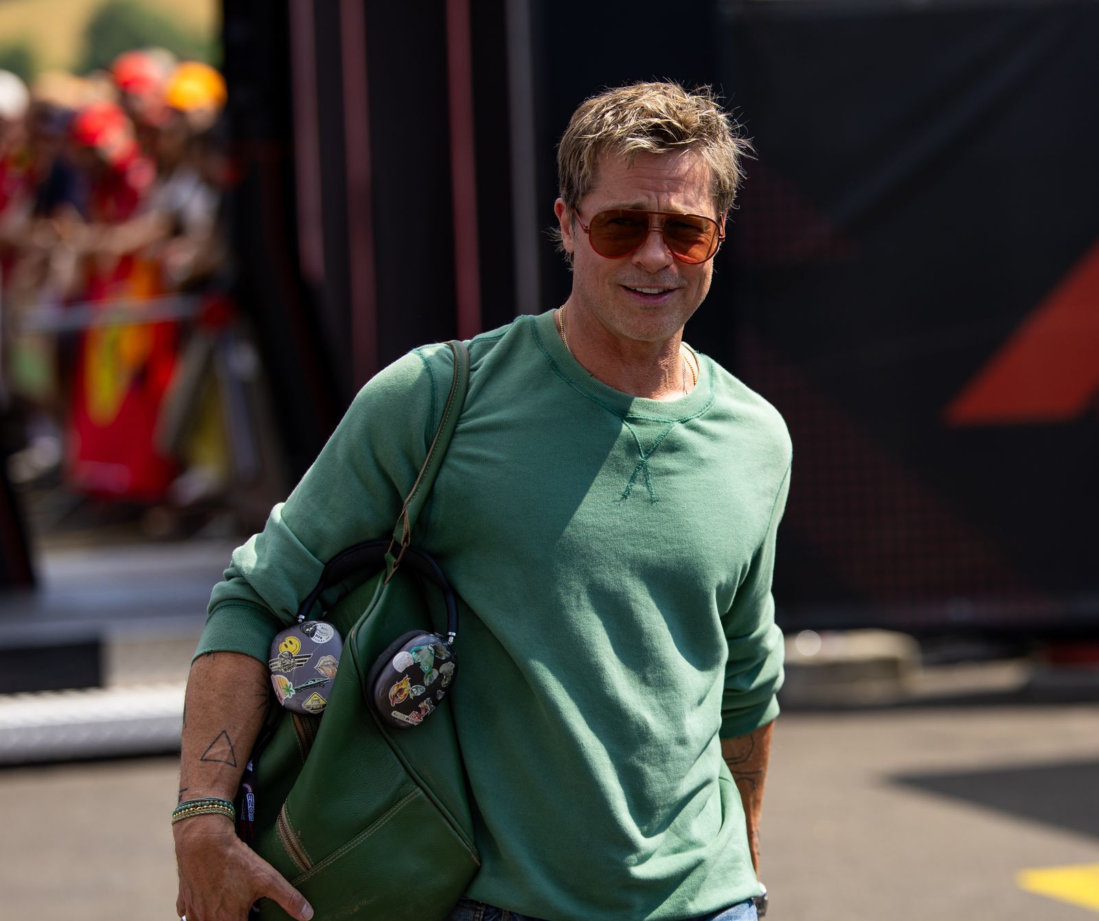 BUDAPEST HUNGARY  JULY 19 American actor Brad Pitt walks in the paddock during practice ahead of the F1 Grand Prix of...