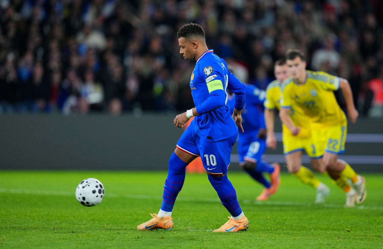 PARIS FRANCE  NOVEMBER 13 Kylian Mbappe of France scores his team's first goal from the penalty spot during the FIFA...