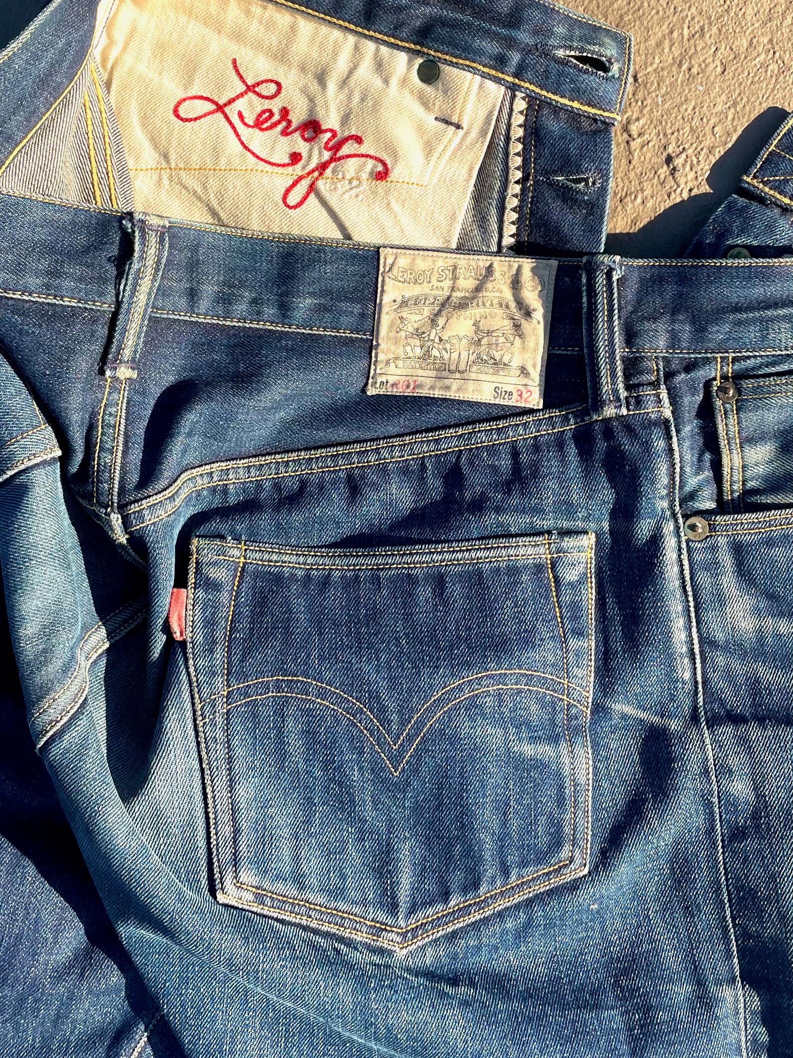 Image may contain Clothing Pants Jeans Coat and Jacket