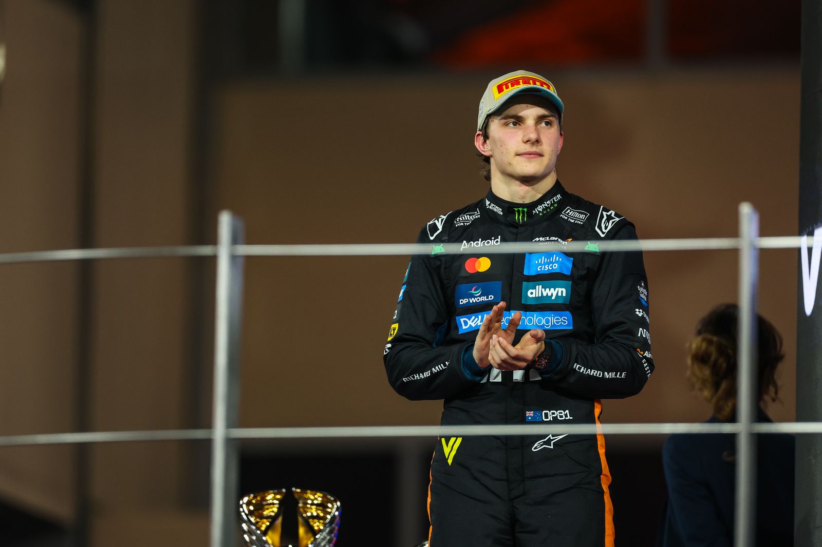ABU DHABI UNITED ARAB EMIRATES  DECEMBER 7 Oscar Piastri of Australia and McLaren looks on on the podium during the F1...