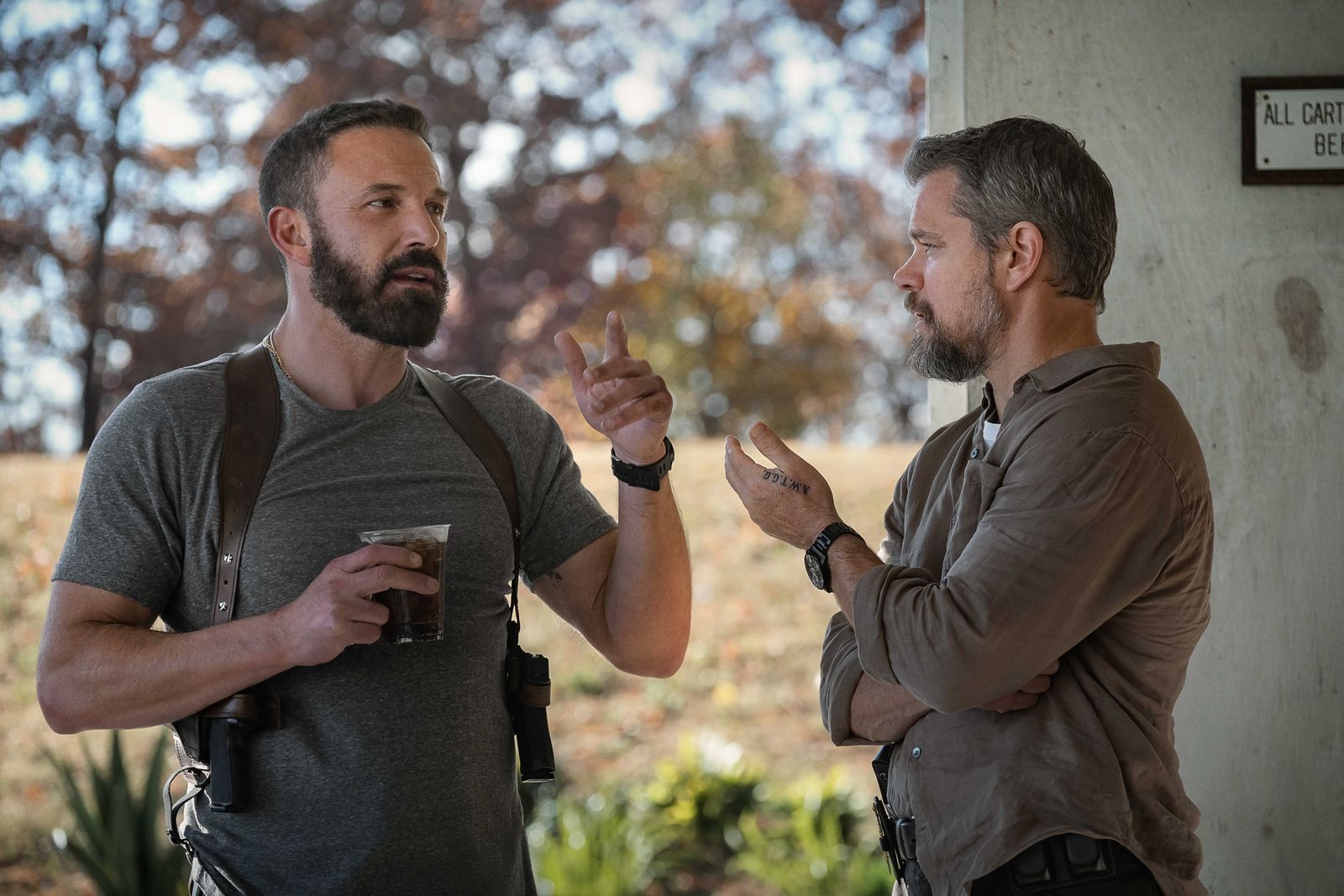 Image may contain Ben Affleck Matt Damon Adult Person Cup and Conversation
