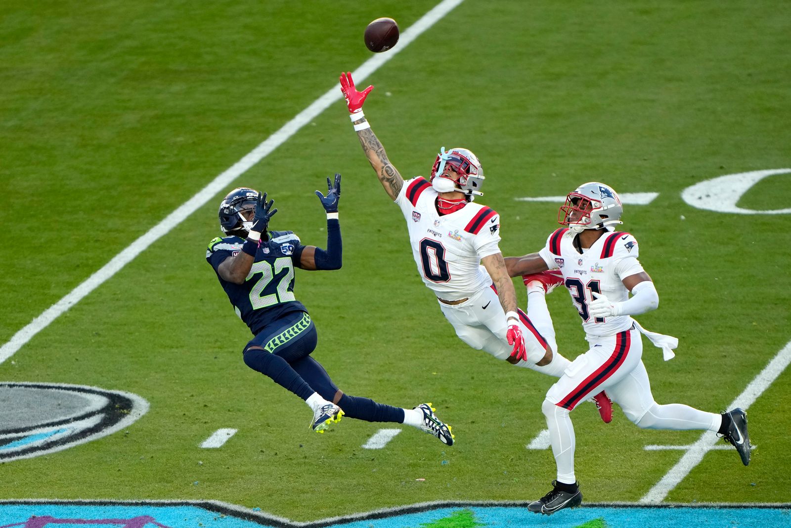 SANTA CLARA CALIFORNIA  FEBRUARY 08 Christian Gonzalez 0 of the New England Patriots breaks up a pass intended for for...