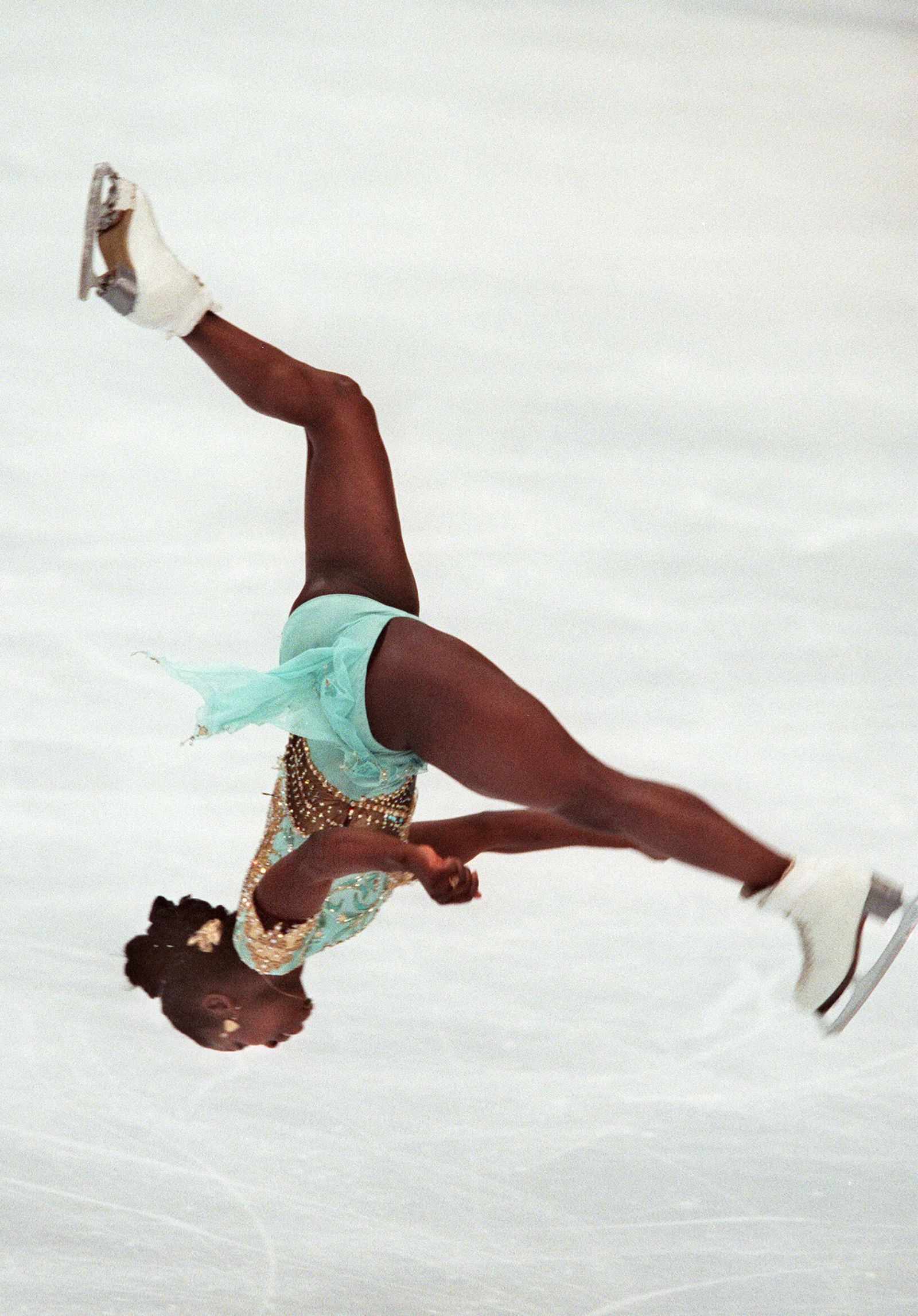 Figure skater Surya Bonnaly doing a backflip