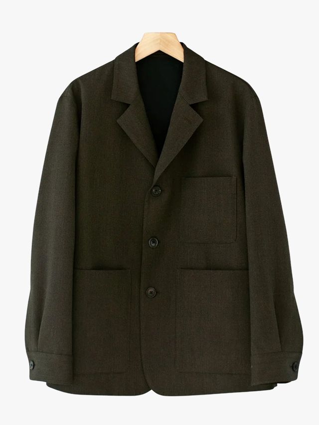 Image may contain Blazer Clothing Coat Jacket Formal Wear and Suit
