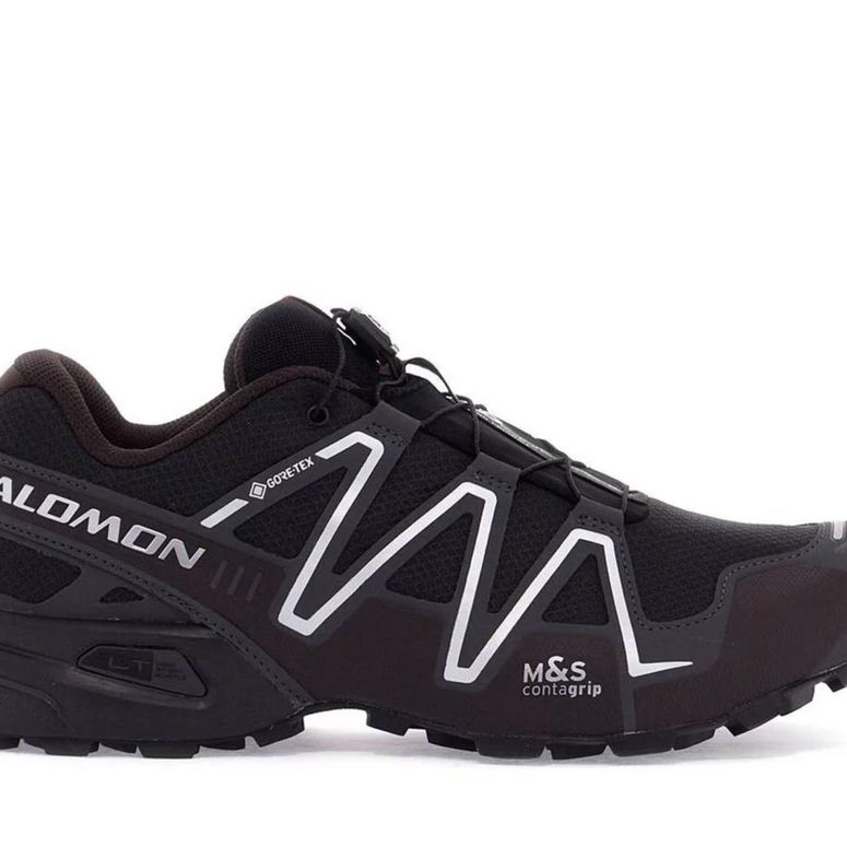 Tenis Salomon Speedcross 3 GTX negros sobre fondo blanco