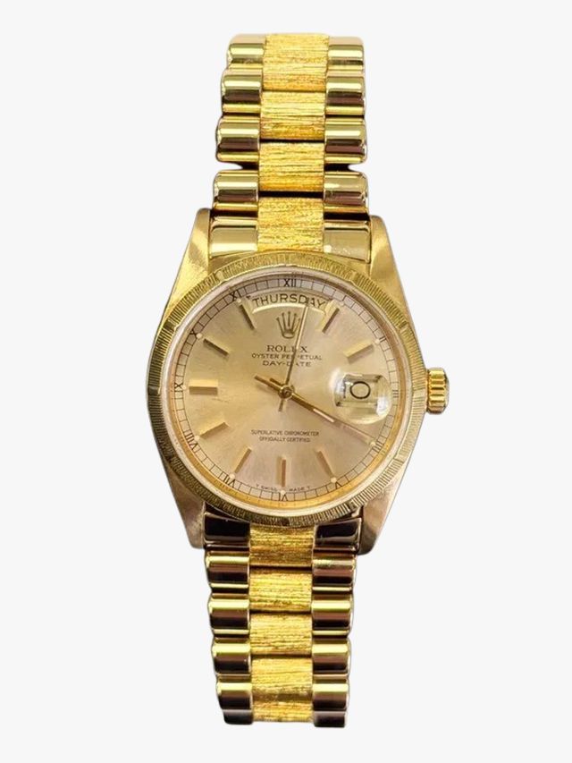 Image may contain Wristwatch Arm Body Part and Person